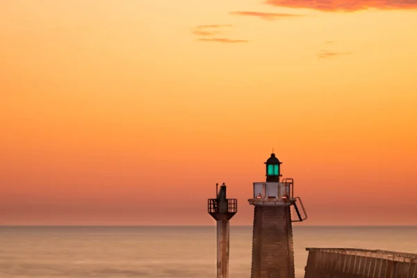 Coucher de soleil sur l'estacade et son phare